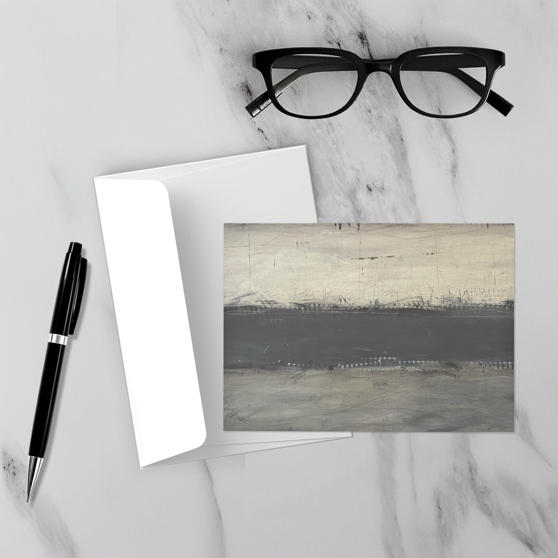 Monochrome abstract artwork displayed unframed in a modern interior, featuring sharp black and gray movement with layered texture and a moody, cinematic feel.