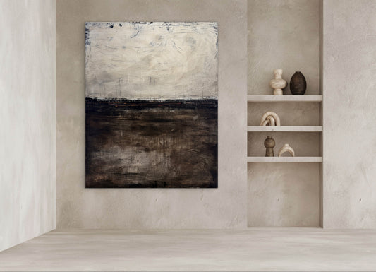 Mockup of a large neutral abstract painting hanging above a sofa, showing a light upper field, dark lower field, and a thin textured dividing line.